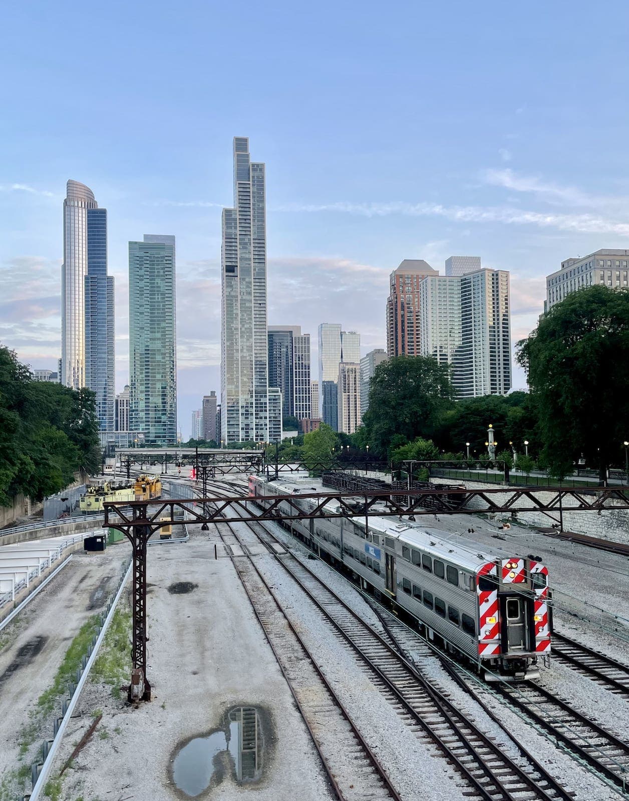 aerial photo of buildings in the South Loop overlooking a Metra Electric District train north of Roosevelt Road